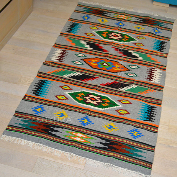 ZorennaGloria handcrafted Ukrainian wool rug with delicate motifs and vibrant colors, showcasing traditional artistry.