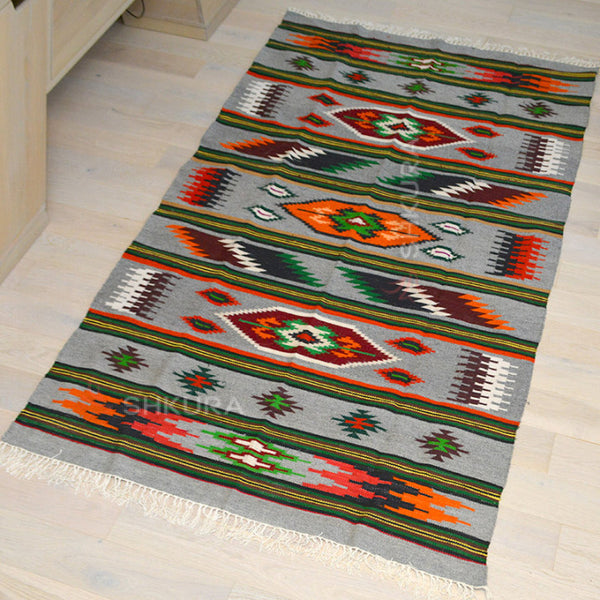 ProminovaSvoboda Ukrainian wool rug with intricate traditional patterns and vibrant colors, handcrafted by skilled artisans.