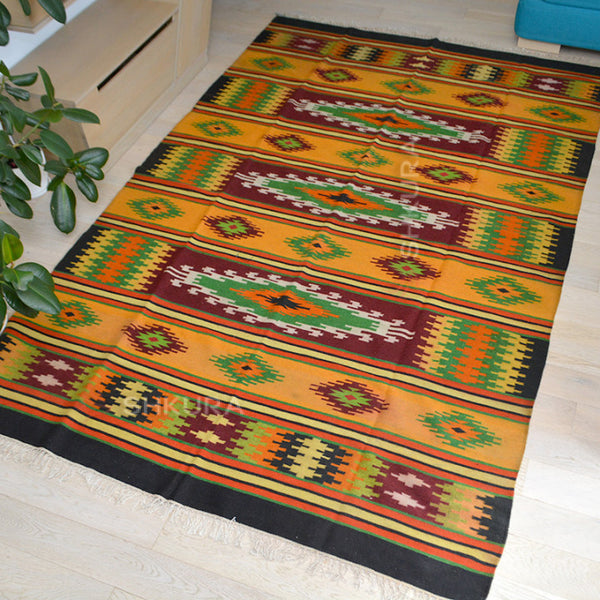 DrevnaVolya Ukrainian wool rug showcasing traditional handwoven patterns inspired by Ukrainian heritage.